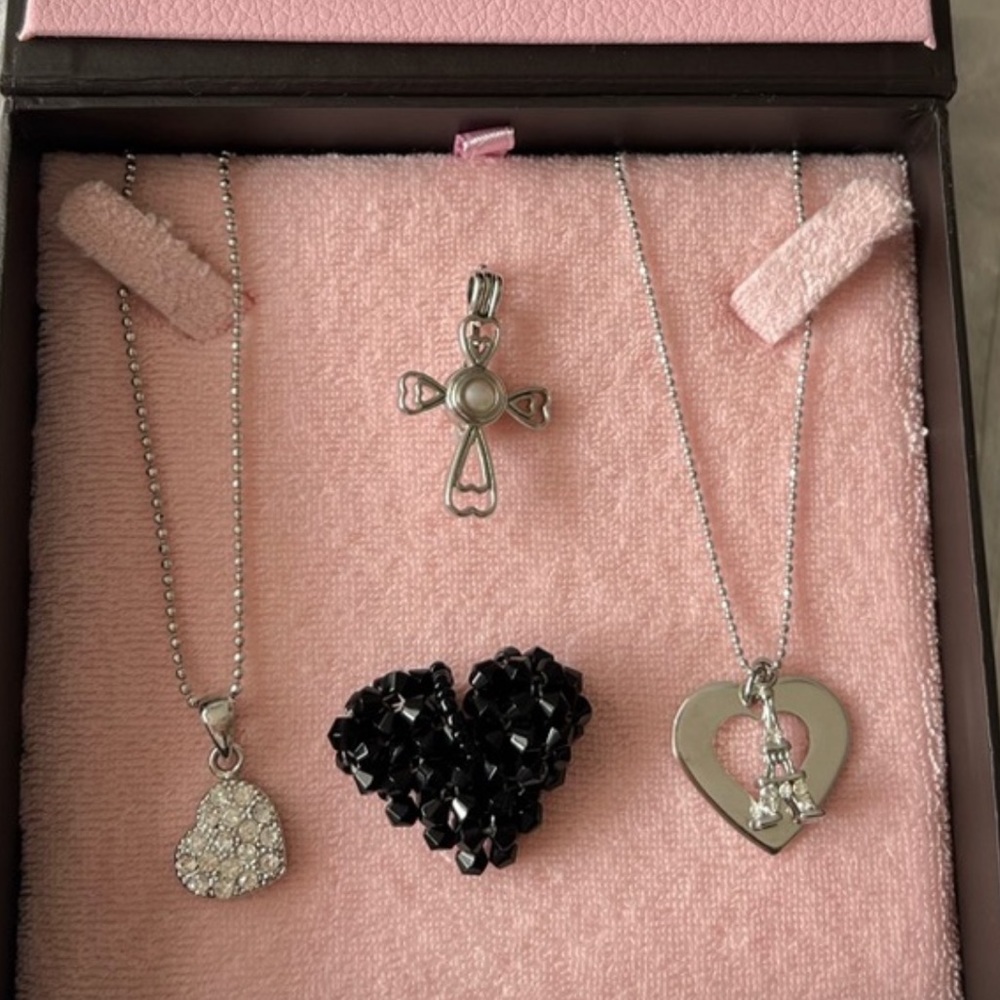 Dainty silver necklaces: Paris, heart, cross